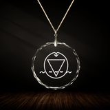 Crystal pendant with engraved symbol AMBA'REES inside