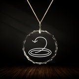 Crystal pendant with engraved symbol ARTEE inside