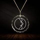 Crystal pendant with engraved symbol ATRANA inside