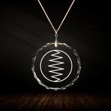 Crystal pendant with engraved symbol ANA inside