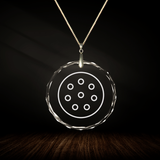 Crystal pendant with engraved symbol LOTUS inside