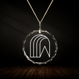 Crystal pendant with engraved symbol EL'AMARA inside