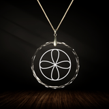 Crystal pendant with engraved symbol GESHA inside