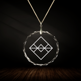 Crystal pendant with engraved symbol HY'LAA'NAR inside
