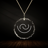 Crystal pendant with engraved symbol JAWES inside