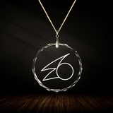 Crystal pendant with engraved symbol MARANA inside