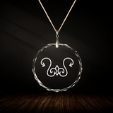 Crystal pendant with engraved symbol MINA'ADJANA inside