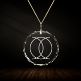 Crystal pendant with engraved symbol MONA'OHA inside