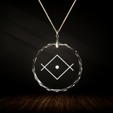 Crystal pendant with engraved symbol OM TAT SAT inside