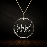 Crystal pendant with engraved symbol SAI'DA'SVA inside