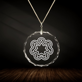 Crystal pendant with engraved symbol SOL'A'VANA inside